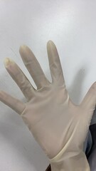hand in gloves.