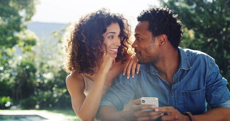 Couple, happy and outdoor with phone for social media, surprise message and contact at home. Man,...
