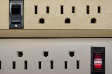 Power distribution strips with on off reset button