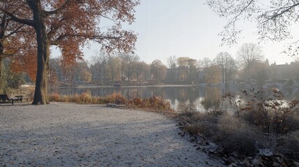 Serene Lake Surrounded by Autumn Colors in Early Morning Light