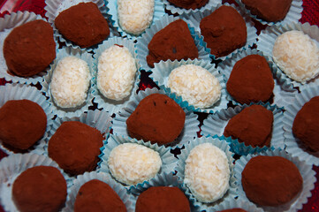 Luxury chocolate truffle. Chocolate praline. Bonbon truffle. Luxury handmade bonbon. Chocolate candy. Homemade chocolate candy sweet. Yummy Valentines day. Valentines Day candy. Top view