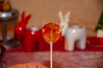 Caramel candy shop. Sweet tooth. Tooth fairy. Yummy lollipop. Organic homemade lollipop. Handmade yummy lollypop. Christmas candy. Lollipop for Christmas. Lollypop sugar candy on stick. Round candy