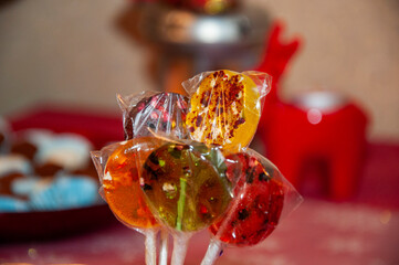 Tooth fairy. Yummy lollipop. Organic homemade lollipop. Handmade yummy lollypop. Christmas candy. Lollipop for Christmas. Lollypop sugar candy on stick. Caramel candy shop. Sweet tooth. Confectionary