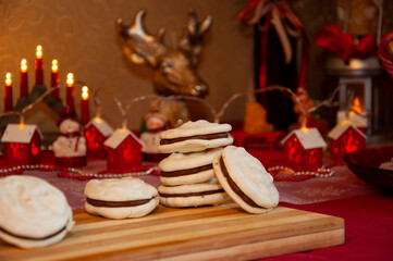 Sweet tooth. Yummy Christmas. Homemade yummy cookie. Xmas eve with family at home. Macaron dessert for Christmas. French macaron. Macaroon cookie. Sweet French macaroon. Gourmet treat