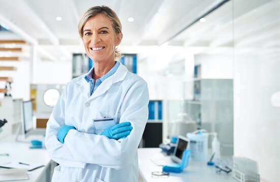 Woman portrait, scientist and arms crossed for innovation in lab, chemical engineer and forensics. Mature person, confident doctor and expert in biology, pathology research and medical study in coat
