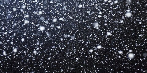 Obraz premium A Stunning Winter Night Scene with Falling Snowflakes