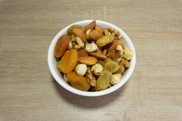 Dried nuts mix. Almond and hazelnut, peanut walnut and seed, coconut. Dry healthy snack. Protein food ingridient.