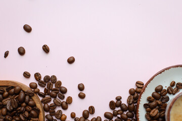 coffee cup with coffee beans on pastel background. flat lay, top view