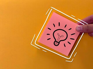 suggest an idea. an icon and a light bulb with the meaning of a new idea. business solutions.