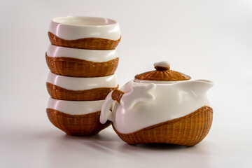 Tea set for making and drinking tea on a white background. Teapot and cups for tea. Tea drinking tradition
