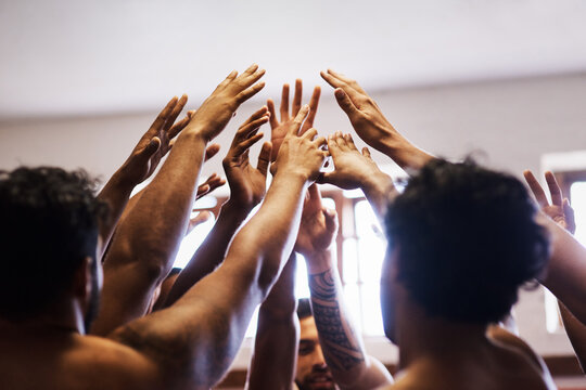 Locker room, people and hands together for motivation, rugby group and prepare for game plan. Men, pile and support collaboration for fitness competition, empowerment and athletes for match strategy - Powered by Adobe