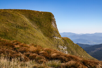 rock of a mountain range in autumn