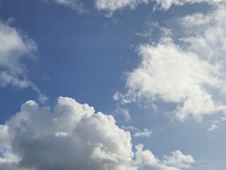 Cumulus Clouds in a Natural Landscape at Horizon