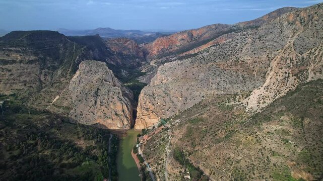 Panoramic Aerial View of Caminito del Rey canyon and a river in spanish mountains of Andalusia Spain