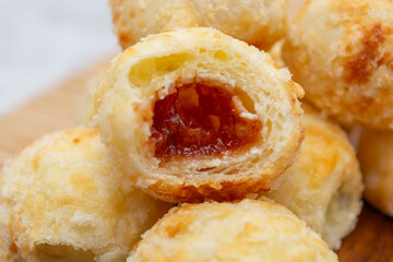 Delicious Brazilian cheese bread stuffed with sweet goiabada.