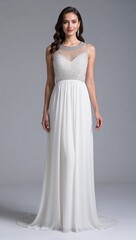 Fototapeta premium Floor length chiffon dress crystal studded neckline white background 
