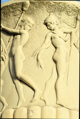 Deciorated urn in front of the Leaning Tower of Pisa