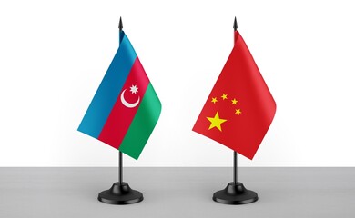 Image of the table flag of Azarbaijan and China countries. White background. Close-up flags. High...