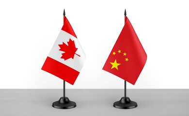 Image of the table flag of Canada and China countries. White background. Close-up flags. High...