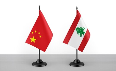 Image of the table flag of China and Lebanon countries. White background. Close-up flags. High...