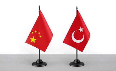 Image of the table flag of China and Turkey countries. White background. Close-up flags. High...