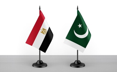 Image of the table flag of Egypt and Pakistan countries. White background. Close-up flags. High...