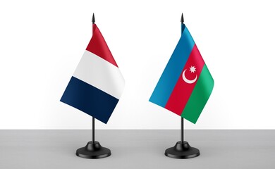 Image of the table flag of France and Azarbaijan countries. White background. Close-up flags. High...