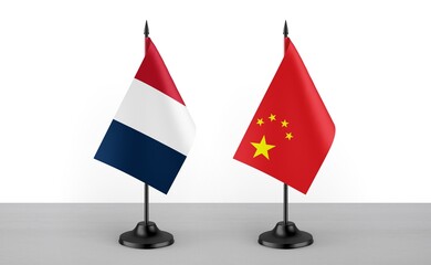 Image of the table flag of France and China countries. White background. Close-up flags. High...