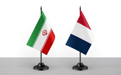 Image of the table flag of Iran and France countries. White background. Close-up flags. High...