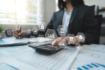 The concept of tax return preparation and financial management. Businessman calculates taxes using calculator and laptop. Icons related to finance, Income tax, tax documents, and savings