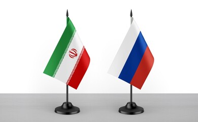 Image of the table flag of Iran and Russia countries. White background. Close-up flags. High...