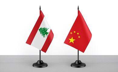 Image of the table flag of Lebanon and China countries. White background. Close-up flags. High...