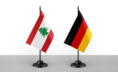 Image of the table flag of Lebanon and Germany countries. White background. Close-up flags. High...