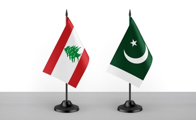 Image of the table flag of Lebanon and Pakistan countries. White background. Close-up flags. High...