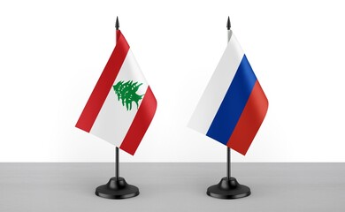 Image of the table flag of Lebanon and Russia countries. White background. Close-up flags. High...