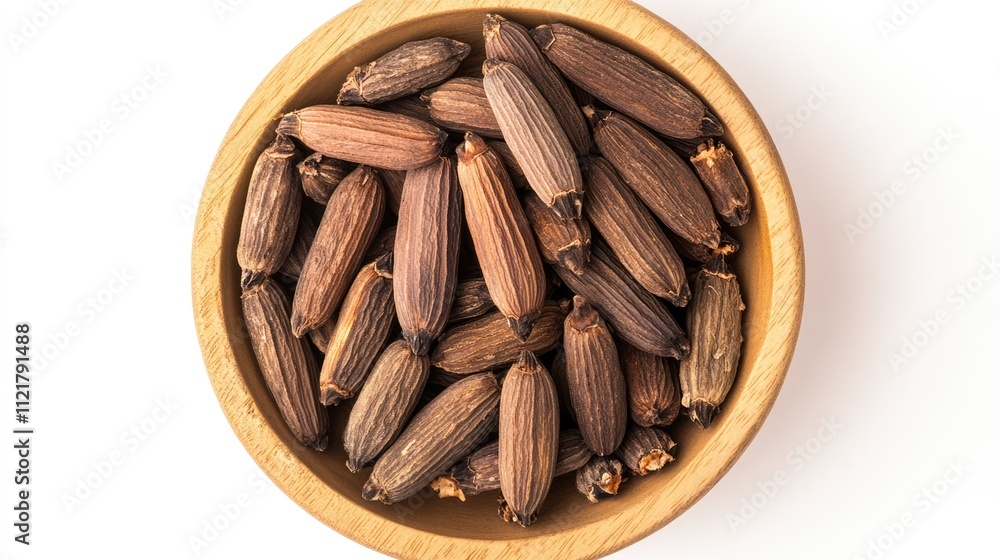 Poster Tonka beans displayed in a wooden bowl on a white background showcasing their unique shape and texture viewed from above