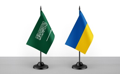 Image of the table flag of Saudi Arabia and Ukraine countries. White background. Close-up flags....