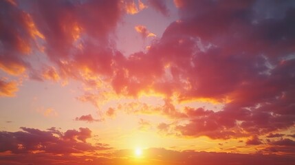 Fototapeta premium Romantic Dusk Twilight with Vibrant Sunset Colors of Red Orange Yellow and Purple Clouds Illuminated by Golden Hour Light