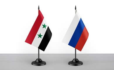 Image of the table flag of Syria and Russia countries. White background. Close-up flags. High...