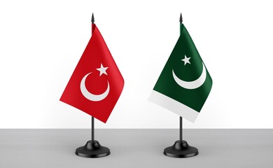 Image of the table flag of Turkey and Pakistan countries. White background. Close-up flags. High...