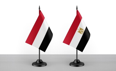 Image of the table flag of Yemen and Egypt countries. White background. Close-up flags. High...