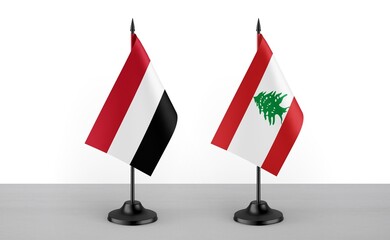 Image of the table flag of Yemen and Lebanon countries. White background. Close-up flags. High...