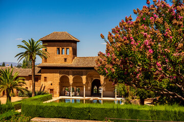 Naklejka premium The Alhambra's Partal Palace with Surrounding Verdure
