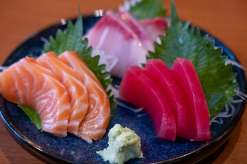 Sashimi set with vegetable served in a restaurant