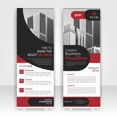 Modern design of annual report display stands showcasing professional graphics in an office environment with red color