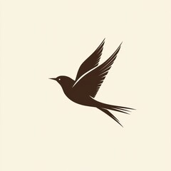 Obraz premium Simple brown silhouette of a bird in flight against a beige background.