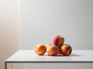 A group of peaches sitting on top of a white table.