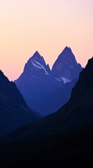 Obraz premium Silhouette of Snow Covered Mountains at Sunset Winter Sunrises and Sunsets, Winter season, Happy New Year, Happy Christmas 