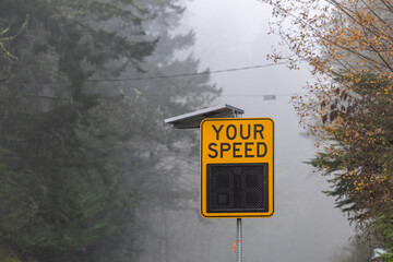 Speed Limit Sign On Foggy Road in Sidney, Vancouver Island