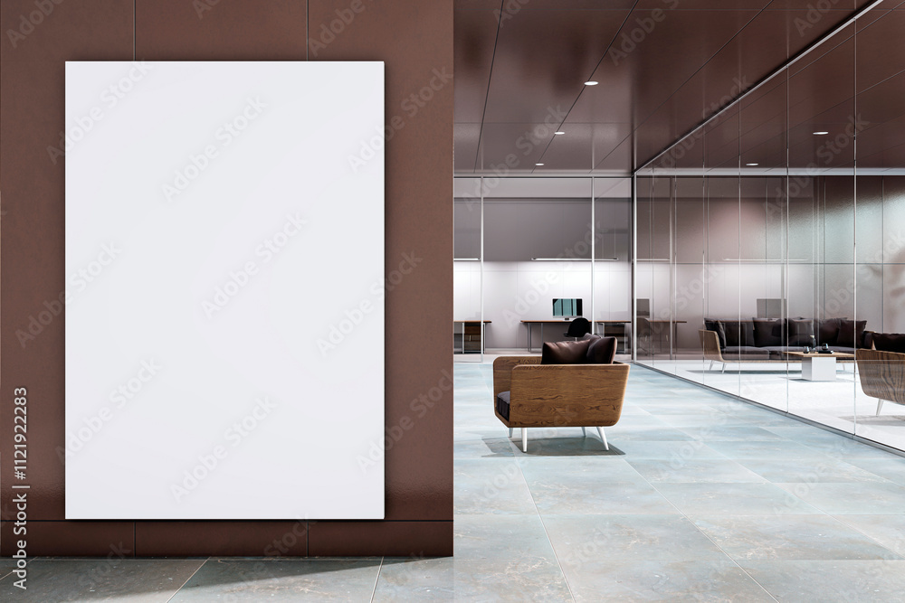 Poster blank vertical canvas on brown wall near modern glass office partition with furniture in corporate s